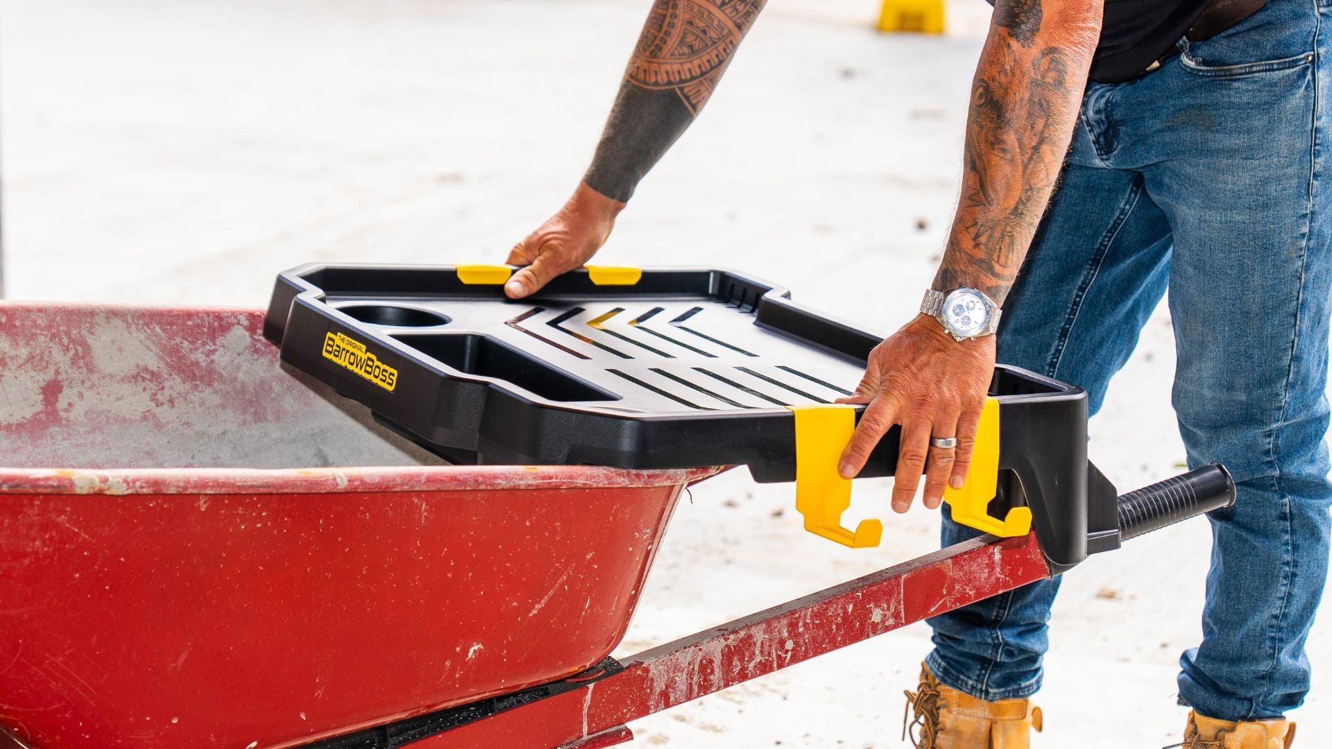  Installing the Barrow Boss wheelbarrow workstation attachment onto a wheelbarrow.